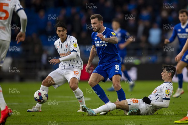 171222 - Cardiff City v Blackpool - Sky Bet Championship - Charlie Patino of Blackpool tackles Joe Ralls of Cardiff City