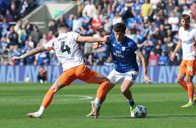 210326 - Cardiff City v Blackpool, EFL Sky Bet League 1 - Rubin Colwill of Cardiff City takes on Olly Casey of Blackpool