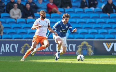 210326 - Cardiff City v Blackpool, EFL Sky Bet League 1 - Ollie Tanner of Cardiff City and CJ Hamilton of Blackpool compete for the ball