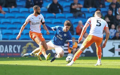 210326 - Cardiff City v Blackpool, EFL Sky Bet League 1 - Ollie Tanner of Cardiff City and CJ Hamilton of Blackpool compete for the ball