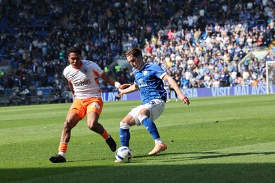 210326 - Cardiff City v Blackpool, EFL Sky Bet League 1 - Cian Ashford of Cardiff City and Reuell Walters of Blackpool compete for the ball