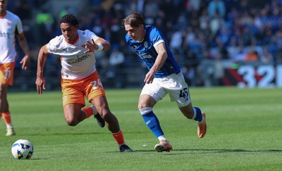 210326 - Cardiff City v Blackpool, EFL Sky Bet League 1 - Cian Ashford of Cardiff City takes on Reuell Walters of Blackpool
