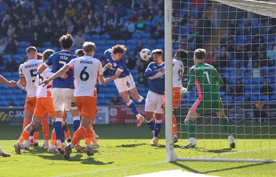 210326 - Cardiff City v Blackpool, EFL Sky Bet League 1 - Blackpool goalkeeper Bailey Peacock-Farrell makes a fingertip save in added time to deny Ryan Wintle of Cardiff City