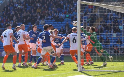 210326 - Cardiff City v Blackpool, EFL Sky Bet League 1 - Blackpool goalkeeper Bailey Peacock-Farrell makes a fingertip save in added time to deny Ryan Wintle of Cardiff City