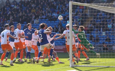 210326 - Cardiff City v Blackpool, EFL Sky Bet League 1 - Blackpool goalkeeper Bailey Peacock-Farrell makes a fingertip save in added time to deny Ryan Wintle of Cardiff City