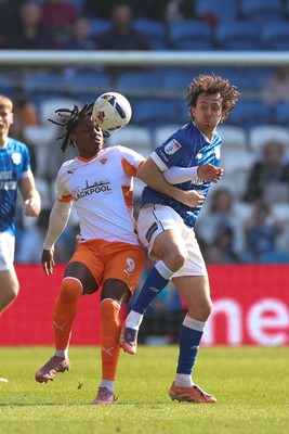 210326 - Cardiff City v Blackpool, EFL Sky Bet League 1 - Ryan Wintle of Cardiff City and Niall Ennis of Blackpool compete for the ball