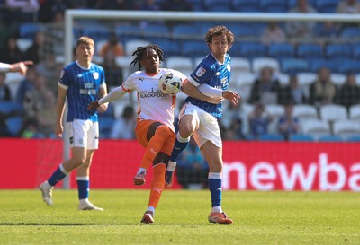 210326 - Cardiff City v Blackpool, EFL Sky Bet League 1 - Ryan Wintle of Cardiff City and Niall Ennis of Blackpool compete for the ball