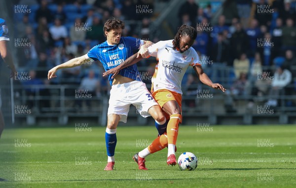 210326 - Cardiff City v Blackpool, EFL Sky Bet League 1 - Perry Ng of Cardiff City and Karoy Anderson of Blackpool compete for the ball