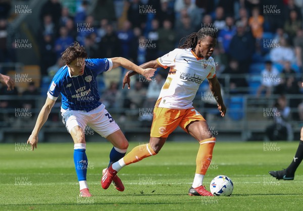 210326 - Cardiff City v Blackpool, EFL Sky Bet League 1 - Perry Ng of Cardiff City and Karoy Anderson of Blackpool compete for the ball