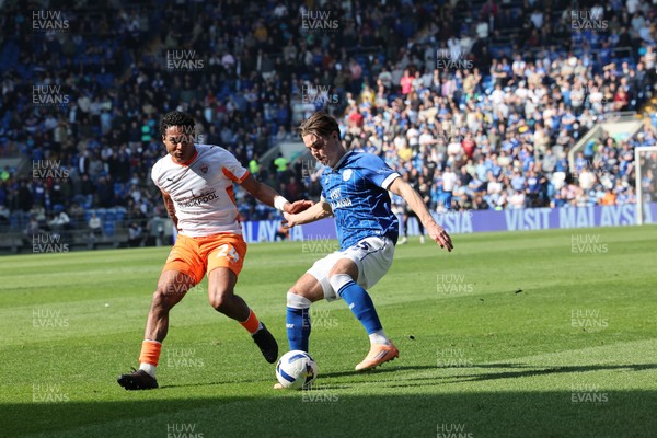 210326 - Cardiff City v Blackpool, EFL Sky Bet League 1 - Cian Ashford of Cardiff City and Reuell Walters of Blackpool compete for the ball