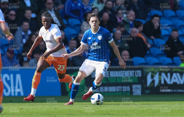 210326 - Cardiff City v Blackpool, EFL Sky Bet League 1 - Perry Ng of Cardiff City gets away from Karoy Anderson of Blackpool