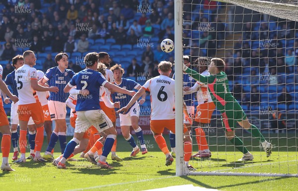 210326 - Cardiff City v Blackpool, EFL Sky Bet League 1 - Blackpool goalkeeper Bailey Peacock-Farrell makes a fingertip save in added time to deny Ryan Wintle of Cardiff City