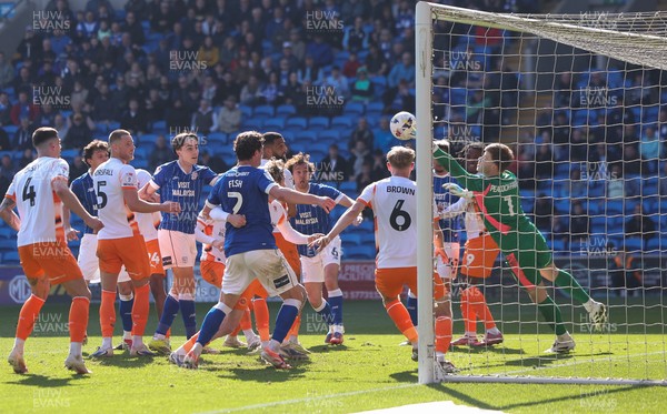 210326 - Cardiff City v Blackpool, EFL Sky Bet League 1 - Blackpool goalkeeper Bailey Peacock-Farrell makes a fingertip save in added time to deny Ryan Wintle of Cardiff City