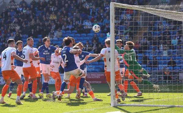 210326 - Cardiff City v Blackpool, EFL Sky Bet League 1 - Blackpool goalkeeper Bailey Peacock-Farrell makes a fingertip save in added time to deny Ryan Wintle of Cardiff City