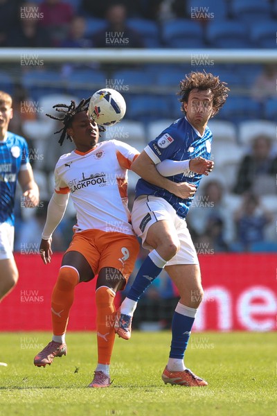 210326 - Cardiff City v Blackpool, EFL Sky Bet League 1 - Ryan Wintle of Cardiff City and Niall Ennis of Blackpool compete for the ball