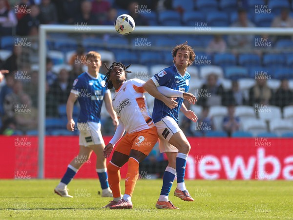 210326 - Cardiff City v Blackpool, EFL Sky Bet League 1 - Ryan Wintle of Cardiff City and Niall Ennis of Blackpool compete for the ball