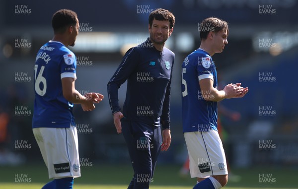 210326 - Cardiff City v Blackpool, EFL Sky Bet League 1 - Cardiff City head coach Brian Barry-Murphy with Chris Willock of Cardiff City and Cian Ashford of Cardiff City at the end of the match