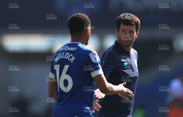 210326 - Cardiff City v Blackpool, EFL Sky Bet League 1 - Cardiff City head coach Brian Barry-Murphy with Chris Willock of Cardiff City at the end of the match