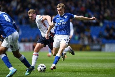 110426 - Cardiff City v Bolton Wanderers - Sky Bet League 1 - Dylan Lawlor of Cardiff City is challenged by Sam Dalby of Bolton