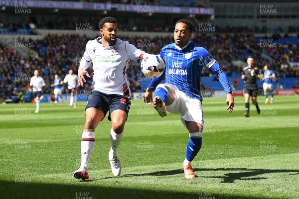 110426 - Cardiff City v Bolton Wanderers - Sky Bet League 1 - Chris Willock of Cardiff City is challenged by Cyrus Christie of Bolton