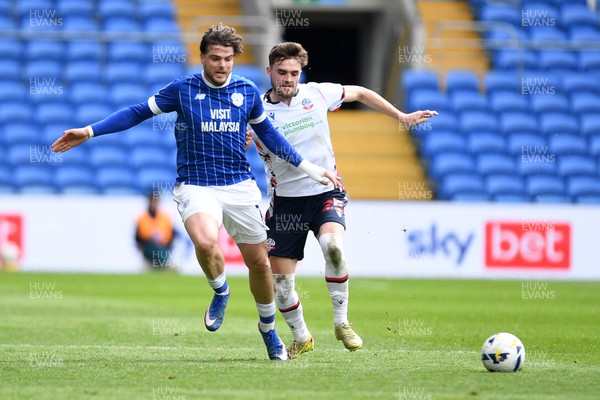 110426 - Cardiff City v Bolton Wanderers - Sky Bet League 1 - Ollie Tanner of Cardiff City is challenged by Max Conway of Bolton