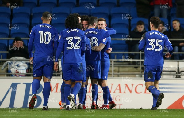 130218 - Cardiff City v Bolton Wanderers - SkyBet Championship - Sean Morrison of Cardiff City celebrates with team mates after scoring a goal