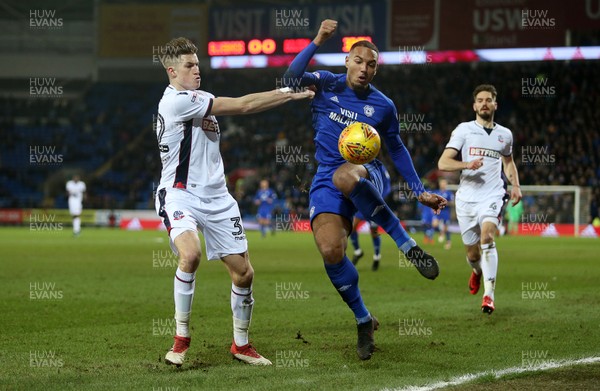 130218 - Cardiff City v Bolton Wanderers - SkyBet Championship - Kenneth Zohore of Cardiff City is challenged by Reece Burke of Bolton Wanderers