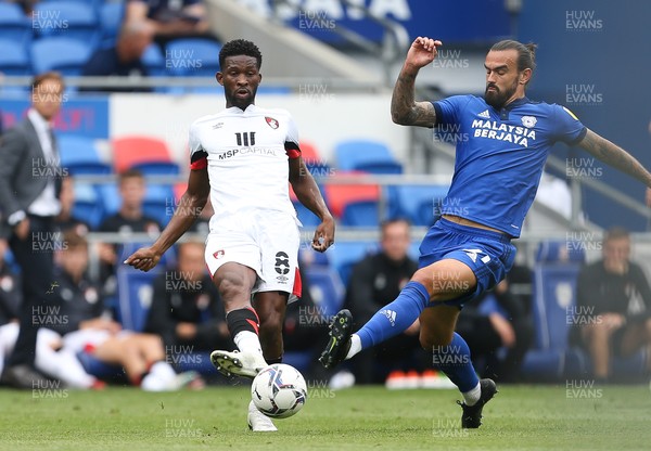 180921 - Cardiff City v Bournemouth, Sky Bet Championship - Jefferson Lerma of Bournemouth plays the ball as Marlon Pack of Cardiff City challenges