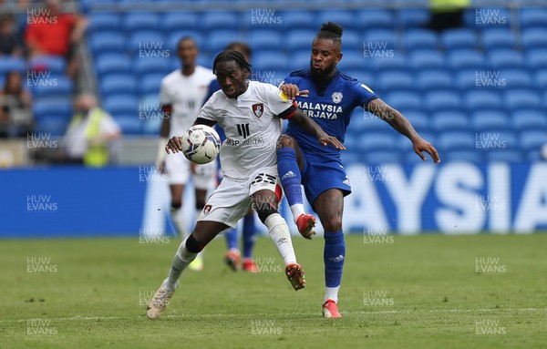 180921 - Cardiff City v Bournemouth, Sky Bet Championship - Jordan Zemura of Bournemouth and Leandro Bacuna of Cardiff City compete for the ball