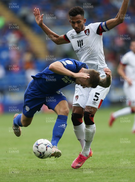 180921 - Cardiff City v Bournemouth, Sky Bet Championship - Lloyd Kelly of Bournemouth brings down James Collins of Cardiff City