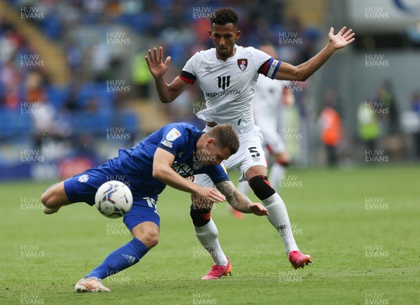 180921 - Cardiff City v Bournemouth, Sky Bet Championship - Lloyd Kelly of Bournemouth brings down James Collins of Cardiff City