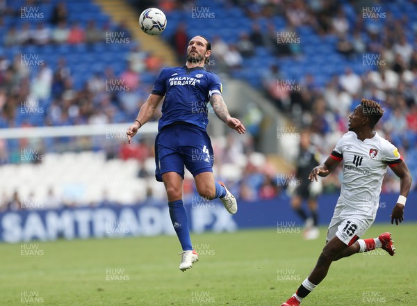 180921 - Cardiff City v Bournemouth, Sky Bet Championship - Sean Morrison of Cardiff City wins the ball