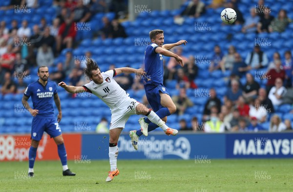 180921 - Cardiff City v Bournemouth, Sky Bet Championship - Ben Pearson of Bournemouth competes with Will Vaulks of Cardiff City