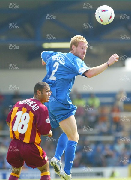 160803 - Cardiff City v Bradford City - Division One - Cardiff's Rhys Weston climbs above Ben Muirhead