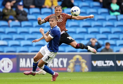 200925 - Cardiff City v Bradford City - SkyBet League One - Antoni Sarcevic of Bradford City is challenged by Joel Bagan of Cardiff City 