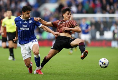 200925 - Cardiff City v Bradford City - SkyBet League One - Tyler Smith of Bradford City is tackled by Yousef Salech of Cardiff City 