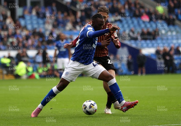 200925 - Cardiff City v Bradford City - SkyBet League One - Ronan Kpakio of Cardiff City is tackled by Will Swan of Bradford City  