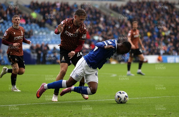 200925 - Cardiff City v Bradford City - SkyBet League One - Ronan Kpakio of Cardiff City is tackled by Will Swan of Bradford City  