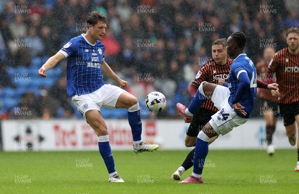 200925 - Cardiff City v Bradford City - SkyBet League One - William Fish and Ronan Kpakio of Cardiff City 