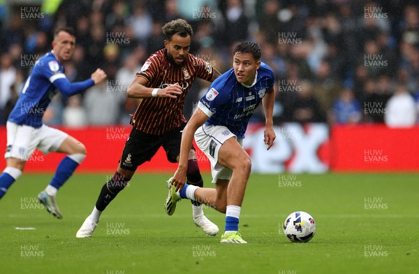 200925 - Cardiff City v Bradford City - SkyBet League One - Rubin Colwill of Cardiff City is challenged by Tyreik Wright of Bradford City 