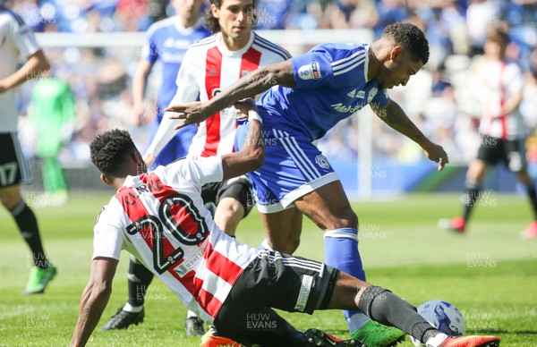 080417 - Cardiff City v Brentford, Sky Bet Championship - Kadeem Harris of Cardiff City is challenged by Josh Clarke of Brentford