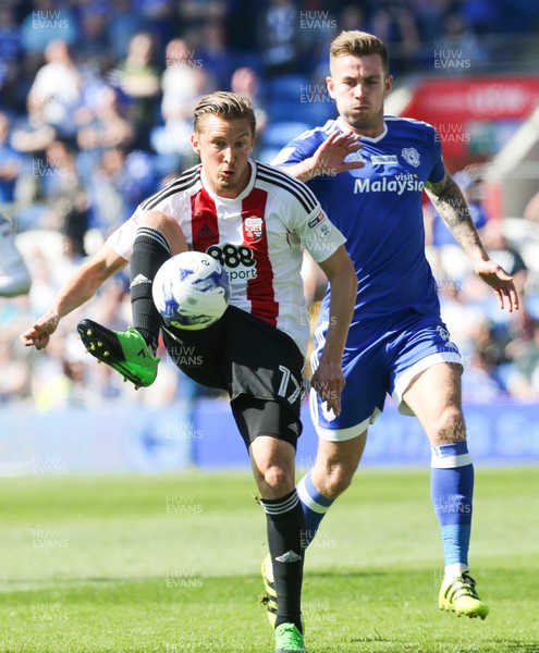 080417 - Cardiff City v Brentford, Sky Bet Championship - Konstantin Kerschbaumer of Brentford is challenged by Joe Ralls of Cardiff City