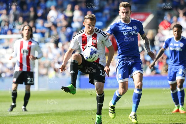 080417 - Cardiff City v Brentford, Sky Bet Championship - Konstantin Kerschbaumer of Brentford is challenged by Joe Ralls of Cardiff City