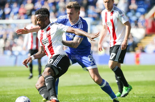 080417 - Cardiff City v Brentford, Sky Bet Championship - Josh Clarke of Brentford is challenged by Joe Ralls of Cardiff City