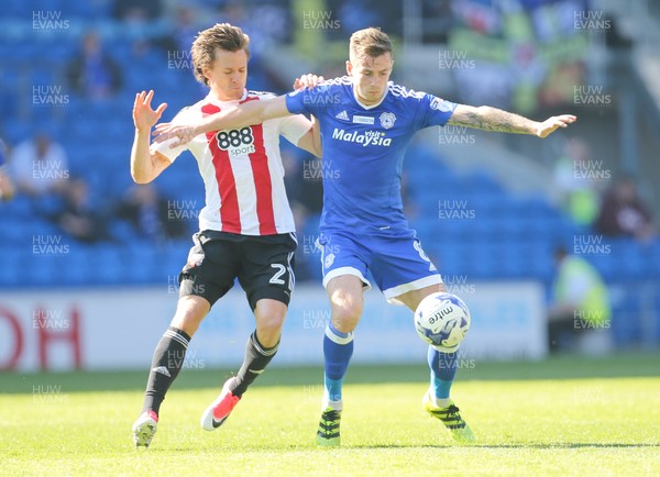 080417 - Cardiff City v Brentford, Sky Bet Championship - Joe Ralls of Cardiff City and Lasse Vibe of Brentford compete for the ball