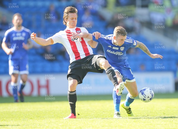 080417 - Cardiff City v Brentford, Sky Bet Championship - Joe Ralls of Cardiff City and Lasse Vibe of Brentford compete for the ball