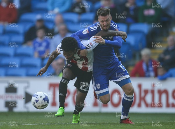 080417 - Cardiff City v Brentford, Sky Bet Championship - Anthony Pilkington of Cardiff City and Rico Henry of Brentford compete for the ball