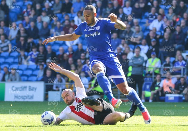 080417 - Cardiff City v Brentford, Sky Bet Championship - Kenneth Zohore of Cardiff City is tackled by Alan McCormack of Brentford