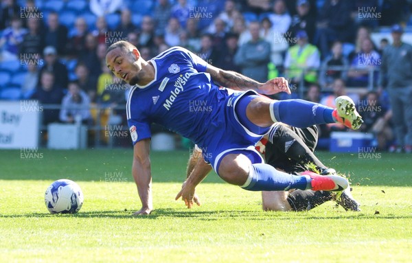 080417 - Cardiff City v Brentford, Sky Bet Championship - Kenneth Zohore of Cardiff City is tackled by Alan McCormack of Brentford