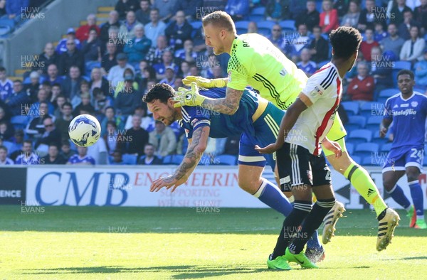 080417 - Cardiff City v Brentford, Sky Bet Championship - Brentford goalkeeper Daniel Bentley claims the ball from Sean Morrison of Cardiff City